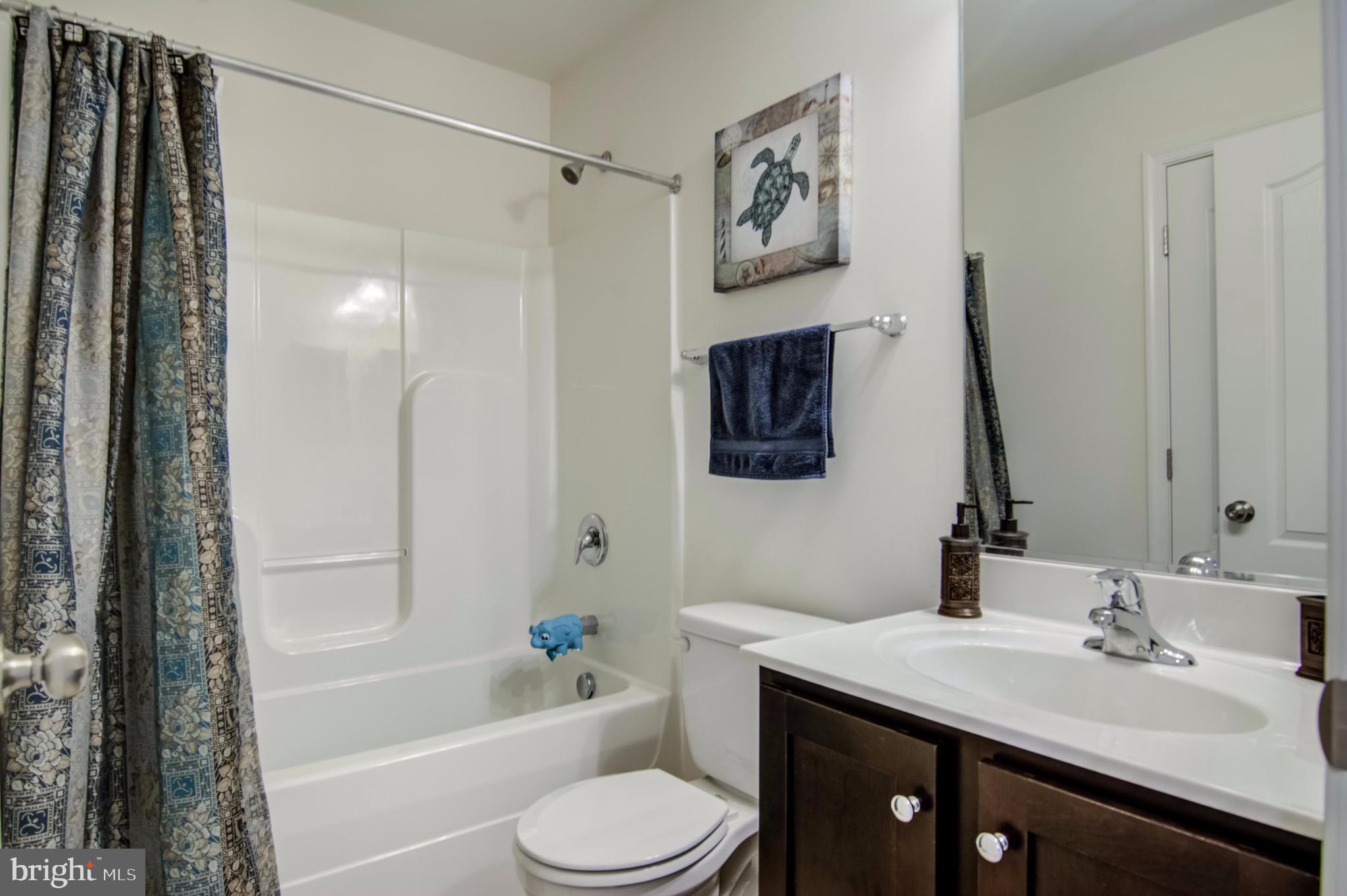 7141 Durrette Road Ruther Glen, VA 22546 - Photo 14 of 25 Upstairs Hall Bathroom