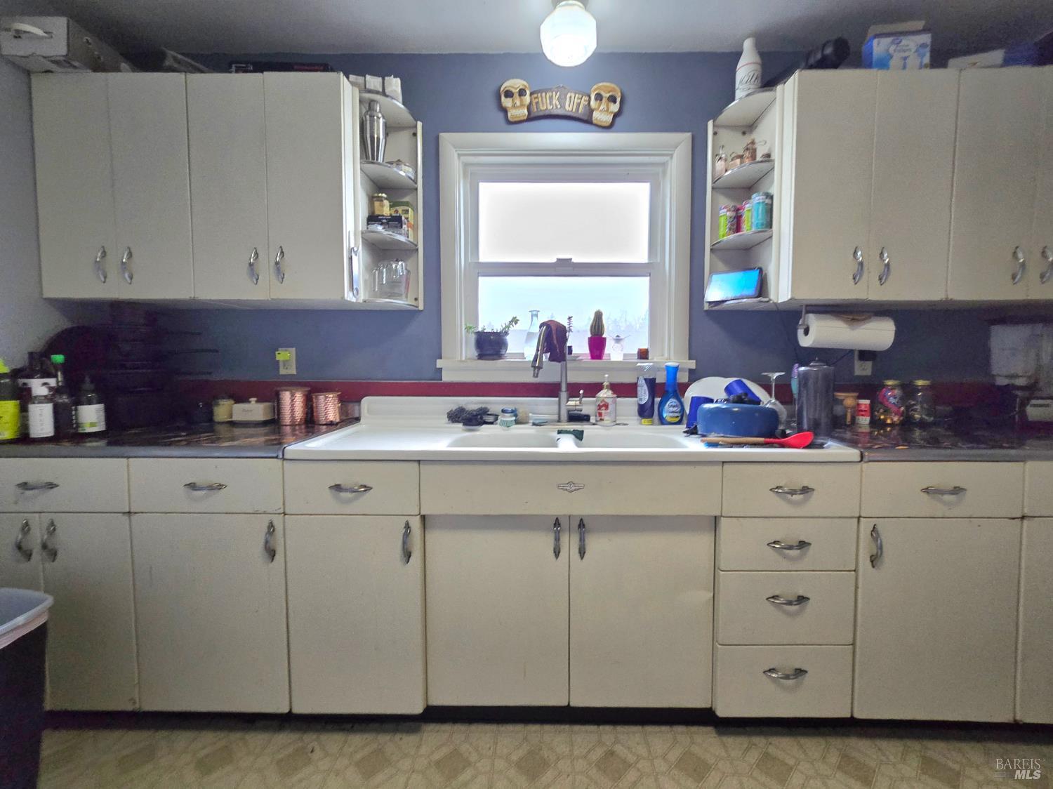 244 South Main Street Willits, CA 95490 - Photo 30 of 48 a kitchen with cabinets appliances and a sink