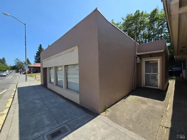 a backyard of a house with seating space