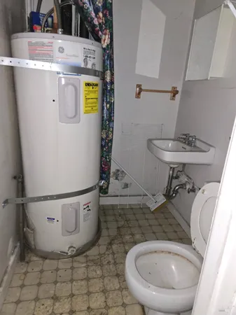 a bathroom with a sink and a toilet
