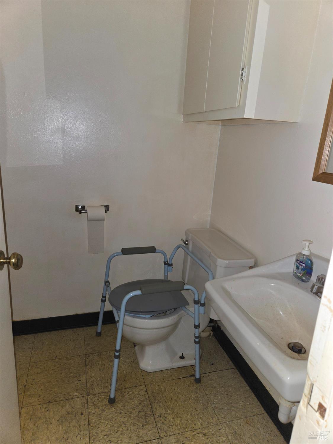 244 South Main Street Willits, CA 95490 - Photo 47 of 48 a bathroom with a sink and a toilet