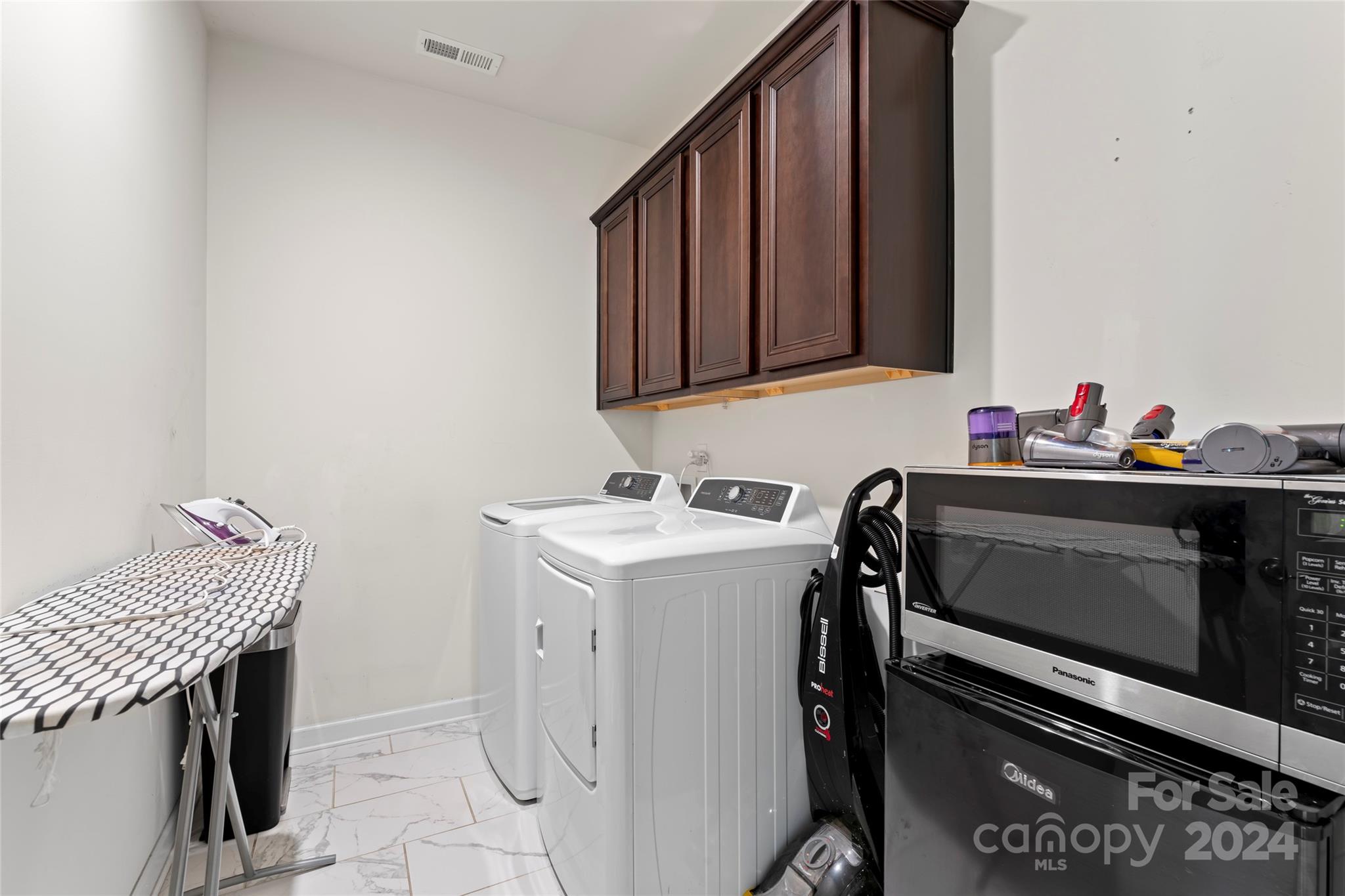 7227 Rupell Drive Charlotte, NC 28273 - Photo 38 of 45 a utility room with dryer and washer