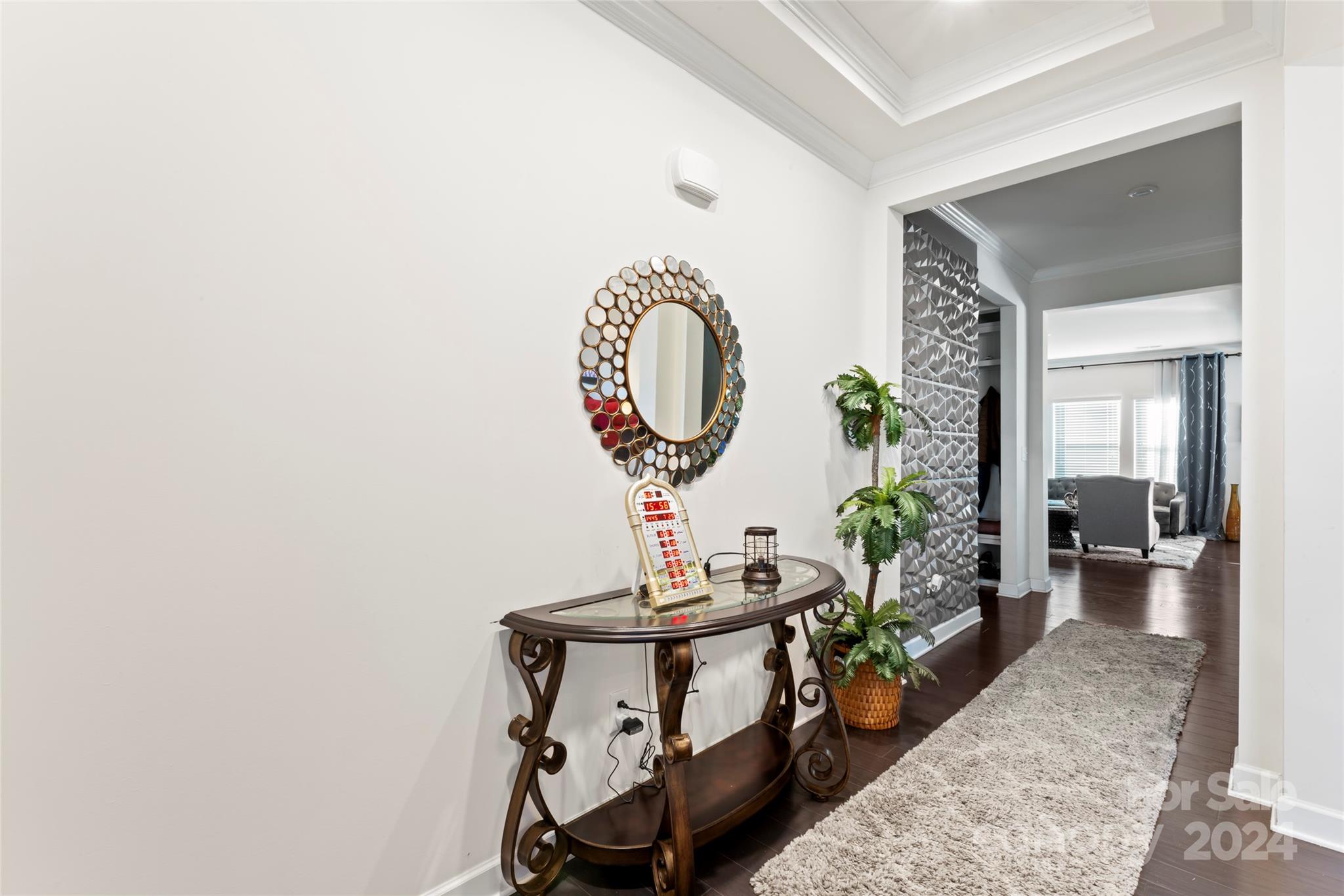 7227 Rupell Drive Charlotte, NC 28273 - Photo 4 of 45 a living room with furniture and a potted plant