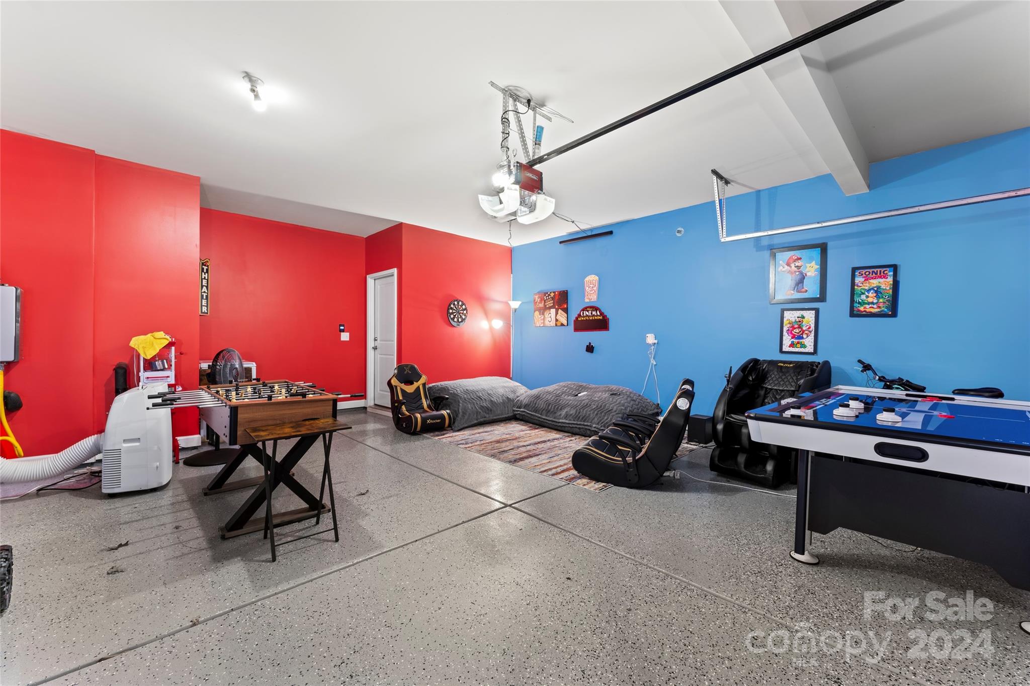 7227 Rupell Drive Charlotte, NC 28273 - Photo 42 of 45 a room with lots of gym equipment