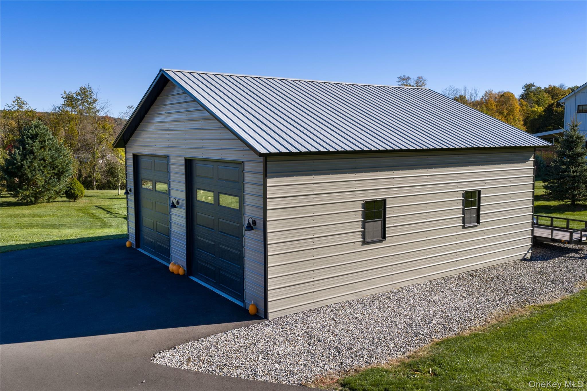 80 Rudd Pond Road Millerton, NY 12546 - Photo 11 of 22 a view of a house with a yard