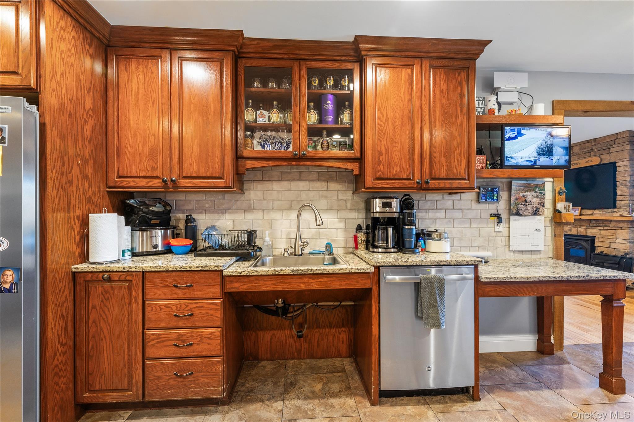 80 Rudd Pond Road Millerton, NY 12546 - Photo 16 of 22 a kitchen with stainless steel appliances granite countertop a stove a sink dishwasher and cabinets with wooden floor
