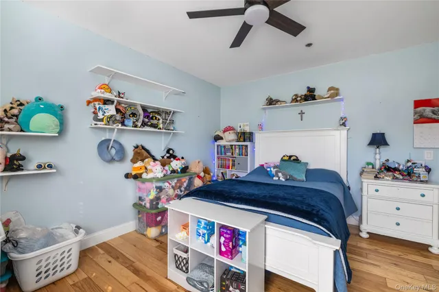 a bed room with a bed and a window