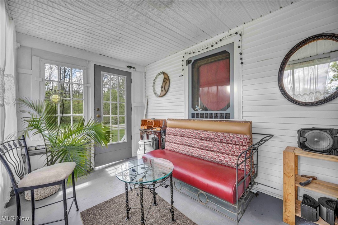 6873 Nichols Road Windham, OH 44288 - Photo 3 of 33 View of sunroom