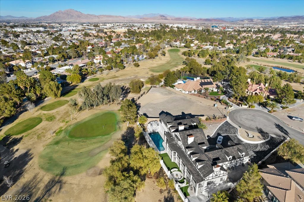 3003 Regency Hill Henderson, NV 89014 - Photo 11 of 13 Perched above the links, a grand estate overlooks rolling fairways and distant mountains.