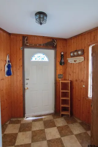 a view of a hallway with closet