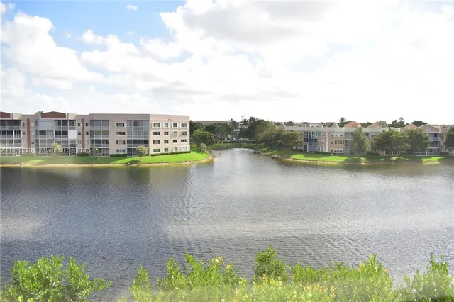 a view of a lake with houses
