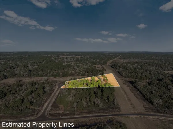 a view of a yard with an outdoor space