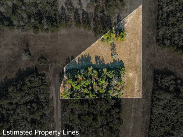 a view of a yard with ocean view