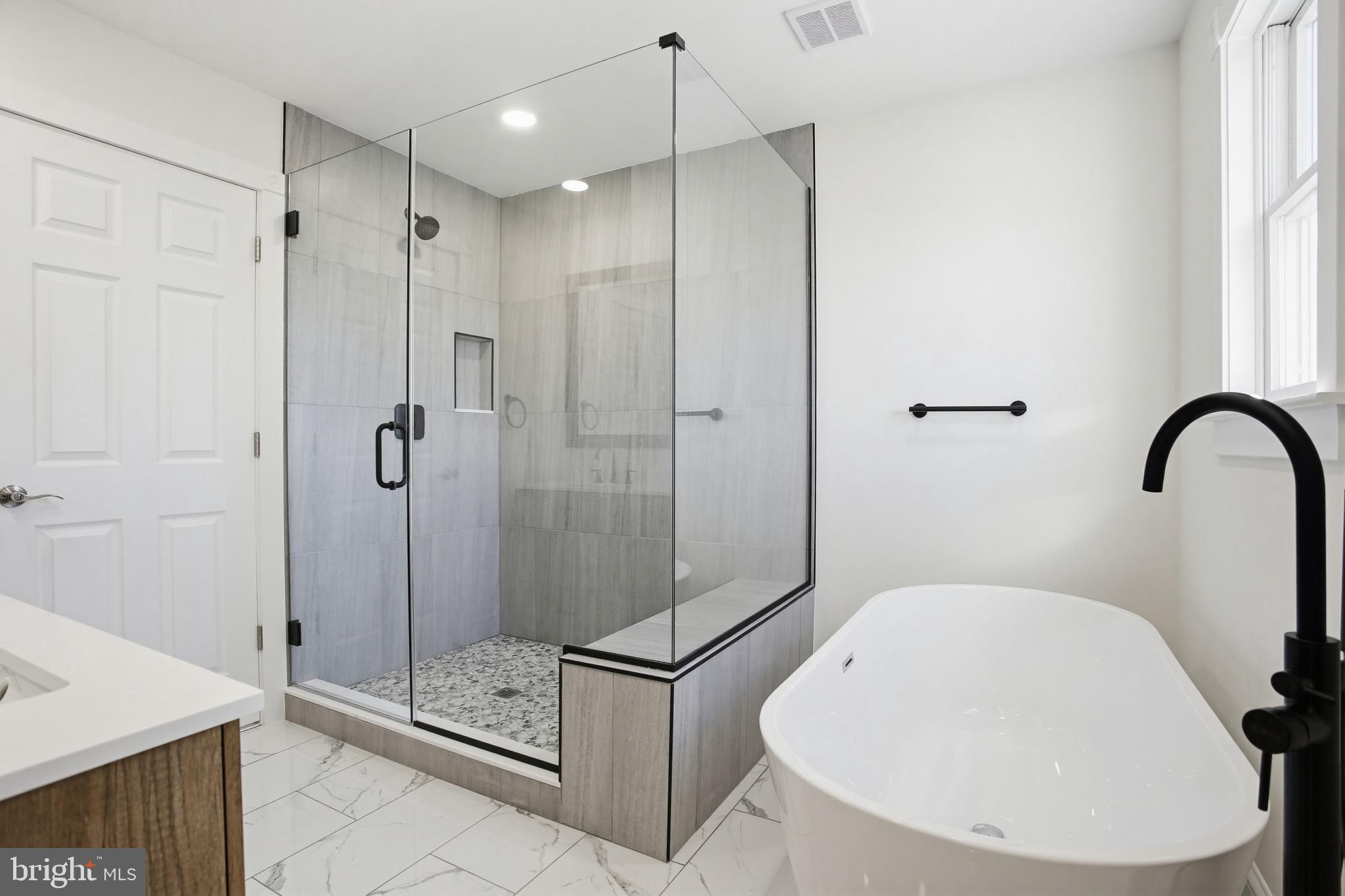 15005 Bushy Park Road Woodbine, MD 21797 - Photo 26 of 75 HUGE WALK IN SHOWER & SOAKING TUB