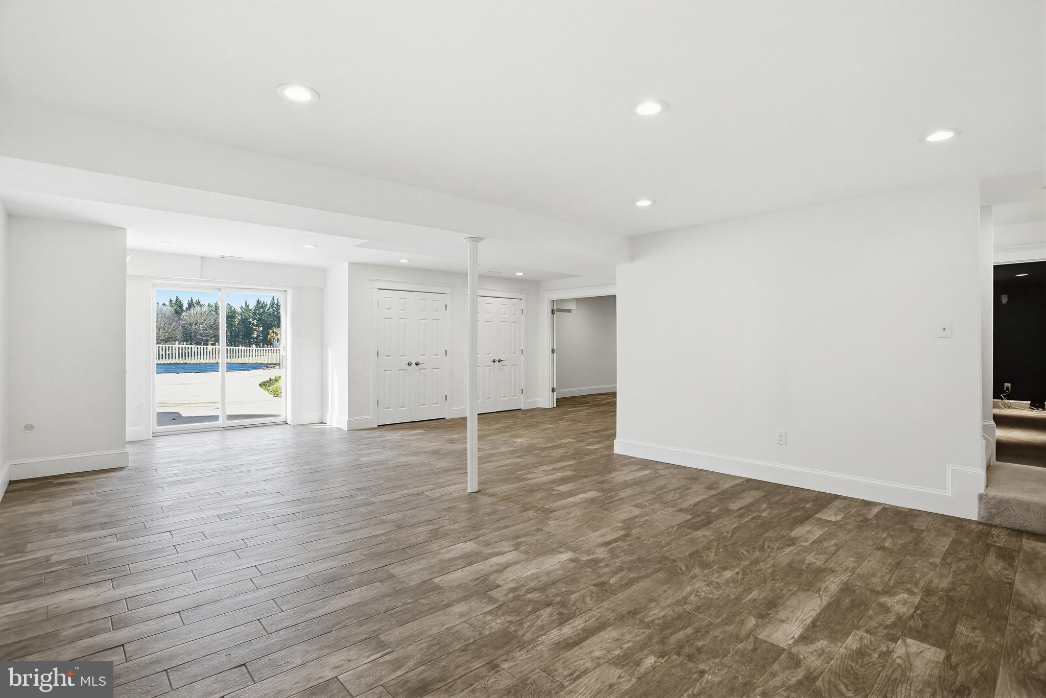 15005 Bushy Park Road Woodbine, MD 21797 - Photo 39 of 75 HUGE RECREATION RM WALK OUT LEVEL TO POOL & PATIO