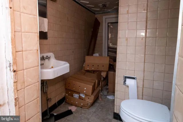 a view of a livingroom with wooden floor