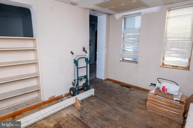 a view of an empty room and window