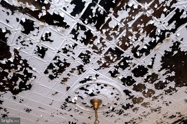 a view of a entryway door with wooden floor