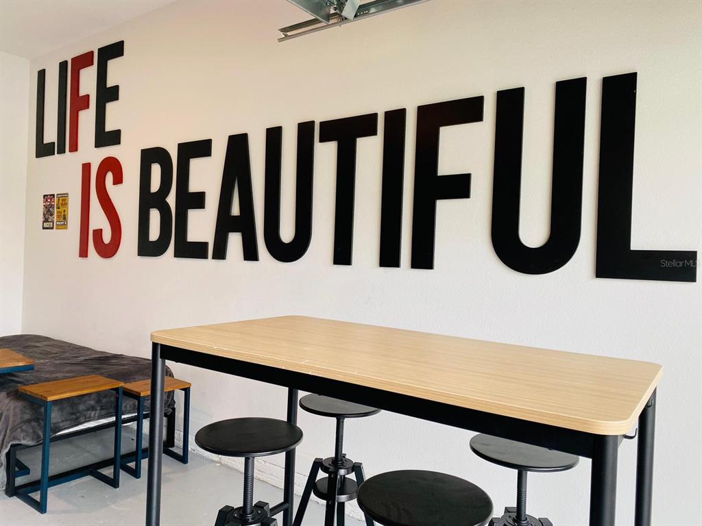 8983 Backswing Way Davenport, FL 33896 - Photo 18 of 30 a bathroom with a table chair and a sink