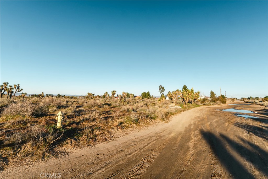 1 Rancho Road Phelan, CA 92371 - Photo 31 of 31 an aerial view of a house with a yard and mountain view in back