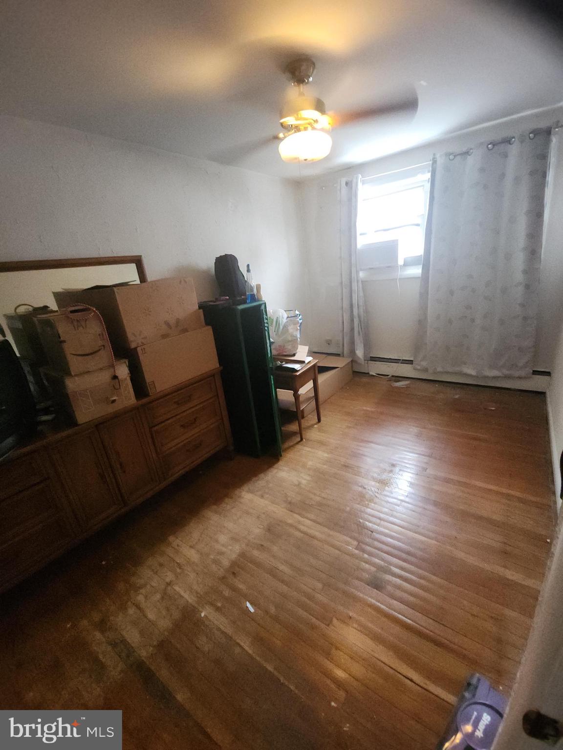 8409 Loretto Avenue Philadelphia, PA 19152 - Photo 11 of 22 a living room with furniture and a lamp
