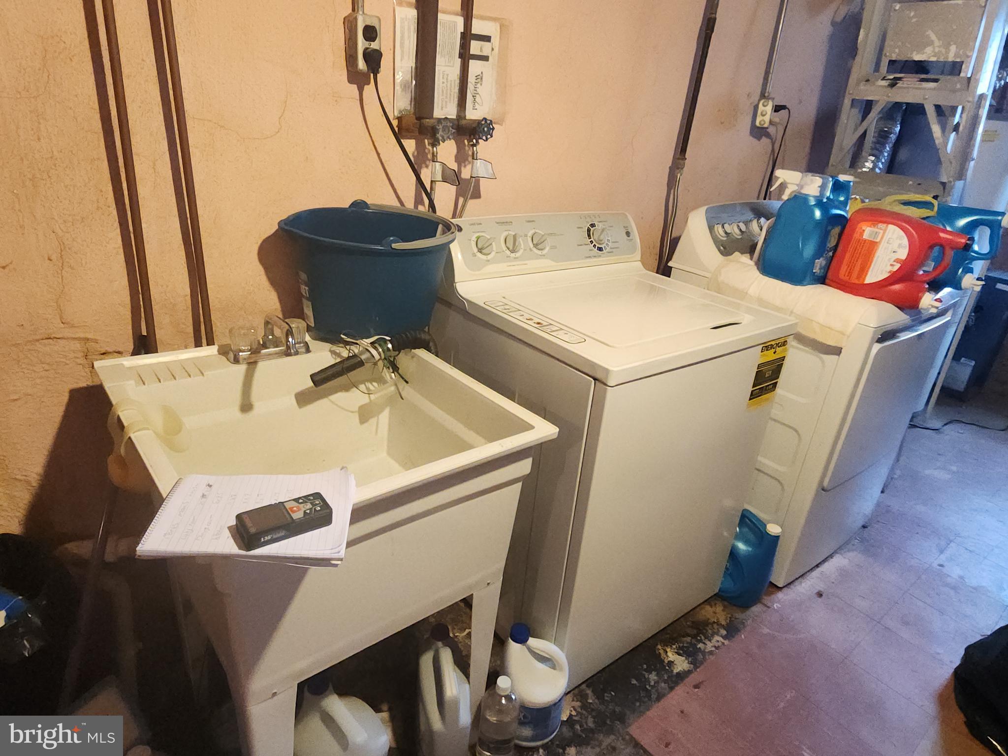 8409 Loretto Avenue Philadelphia, PA 19152 - Photo 18 of 22 a bathroom with a sink and mirror