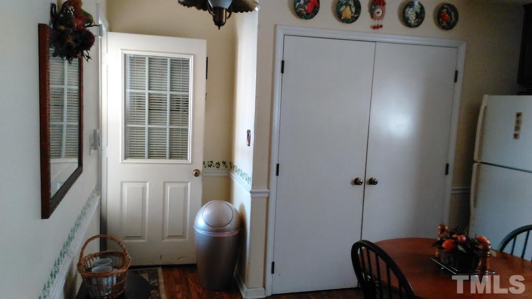 3513 Castlegate Drive Raleigh, NC 27616 - Photo 8 of 22 View of kitchen showing behind the double doors is were the washer and dryer are located