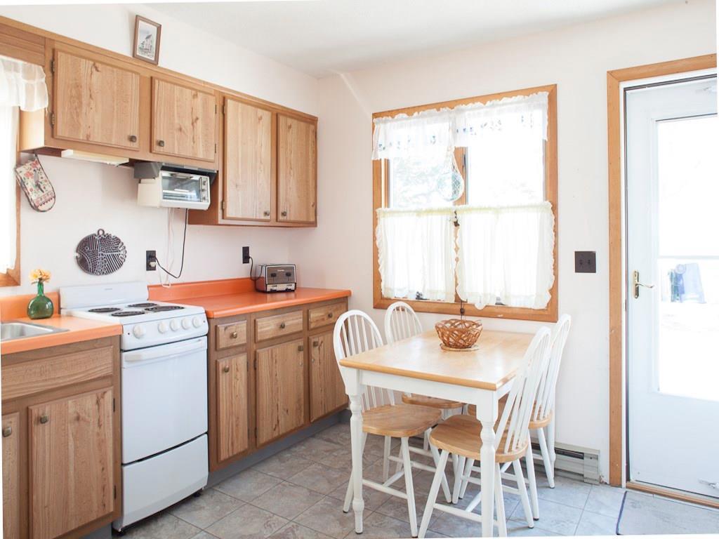 258 Hills Beach Road Biddeford, ME 04005 - Photo 13 of 28 The kitchen opens out to the back yard.