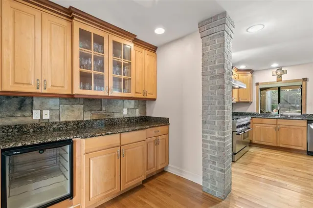a dining room with a table and chairs
