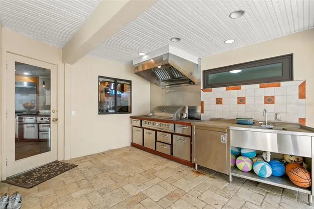 a bedroom with a bed and a walk in closet