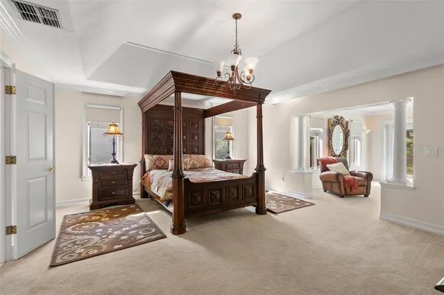 a view of a living room and a kitchen