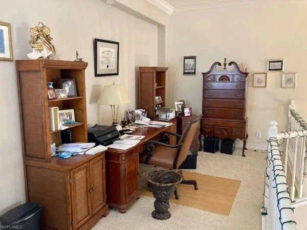 a view of an outdoor sitting area with furniture and backyard