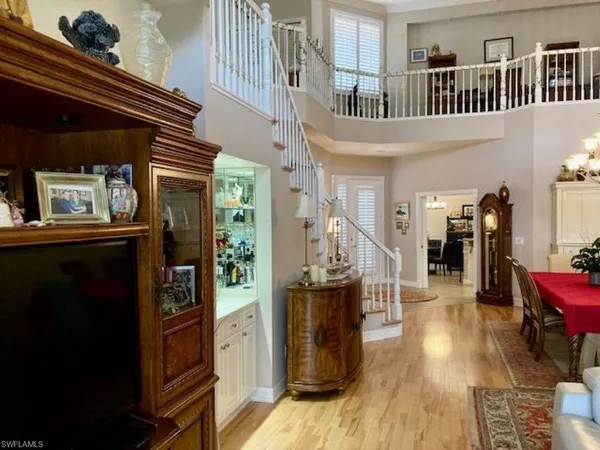 a view of an entryway and livingroom with furniture