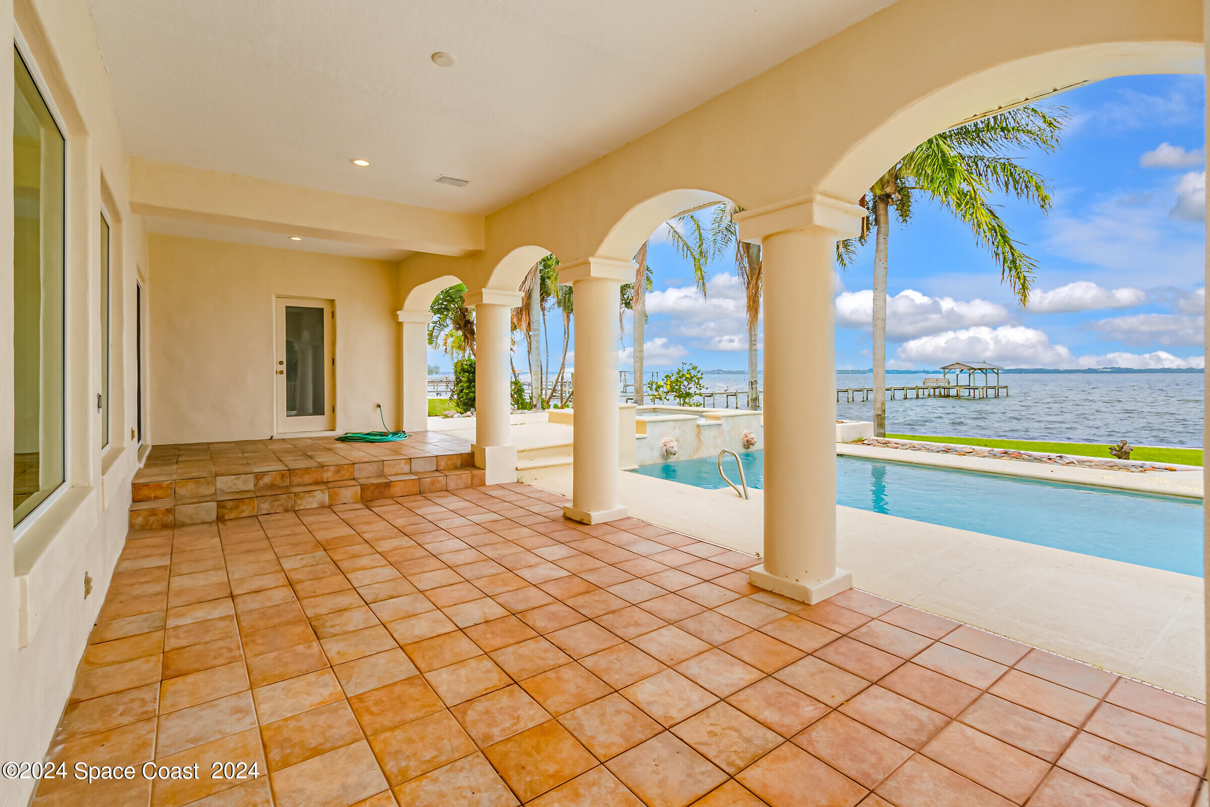 1630 Pine Street Melbourne Beach, FL 32951 - Photo 15 of 54 a view of a swimming pool