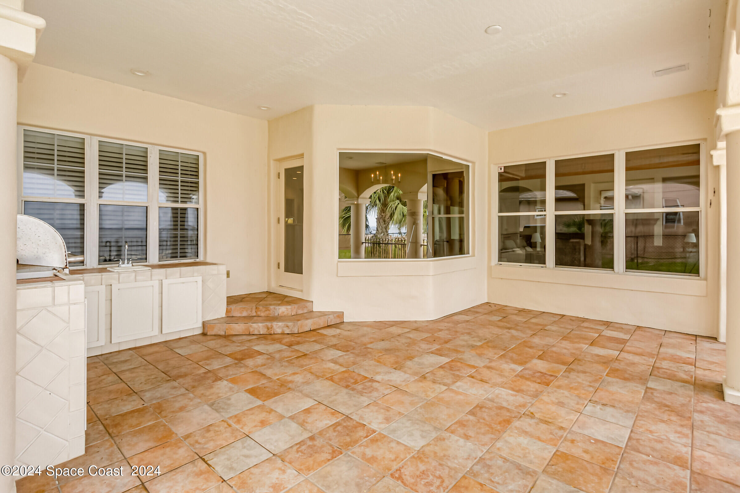 1630 Pine Street Melbourne Beach, FL 32951 - Photo 16 of 54 a view of an empty room with a window