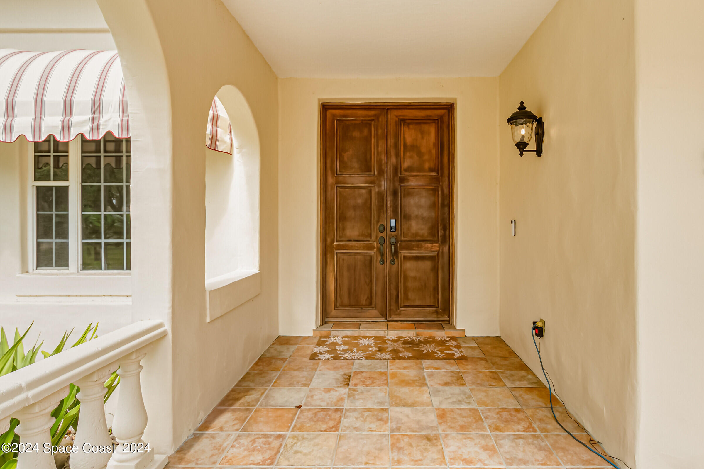 1630 Pine Street Melbourne Beach, FL 32951 - Photo 17 of 54 a view of front door