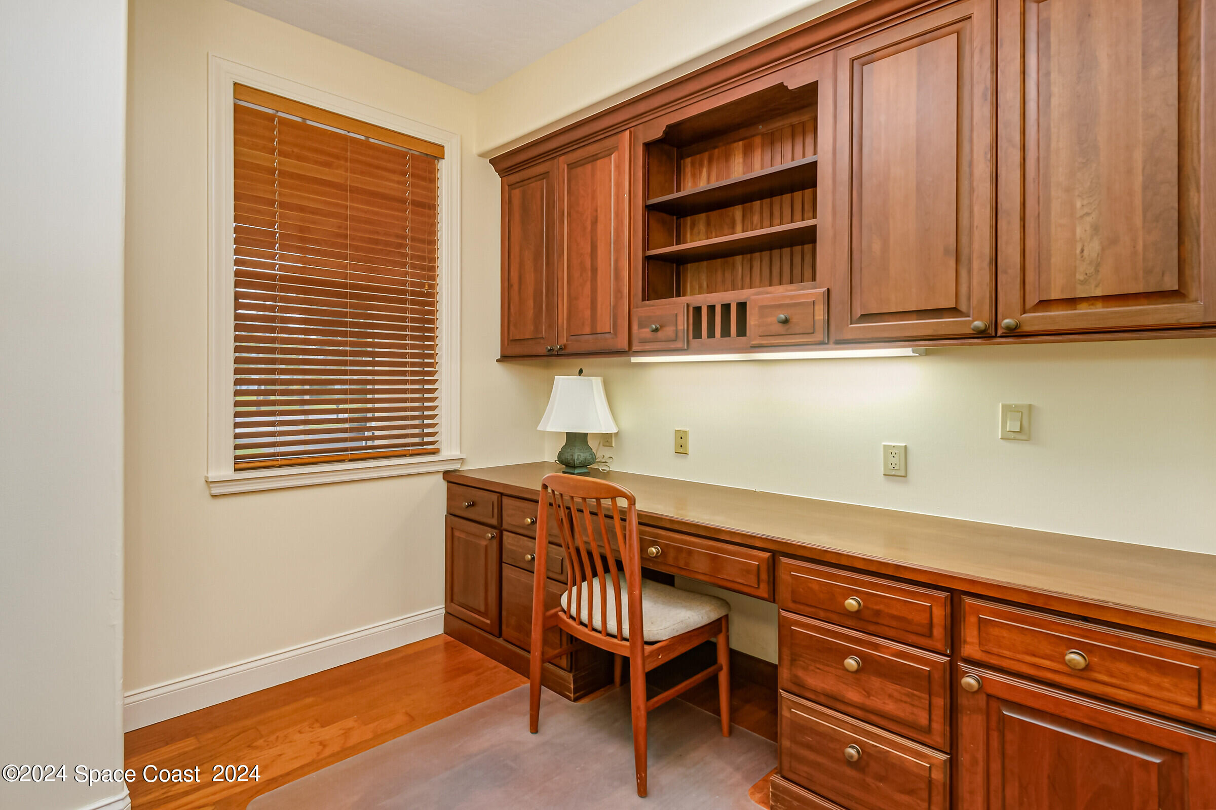 1630 Pine Street Melbourne Beach, FL 32951 - Photo 24 of 54 a kitchen with stainless steel appliances granite countertop a sink and cabinets