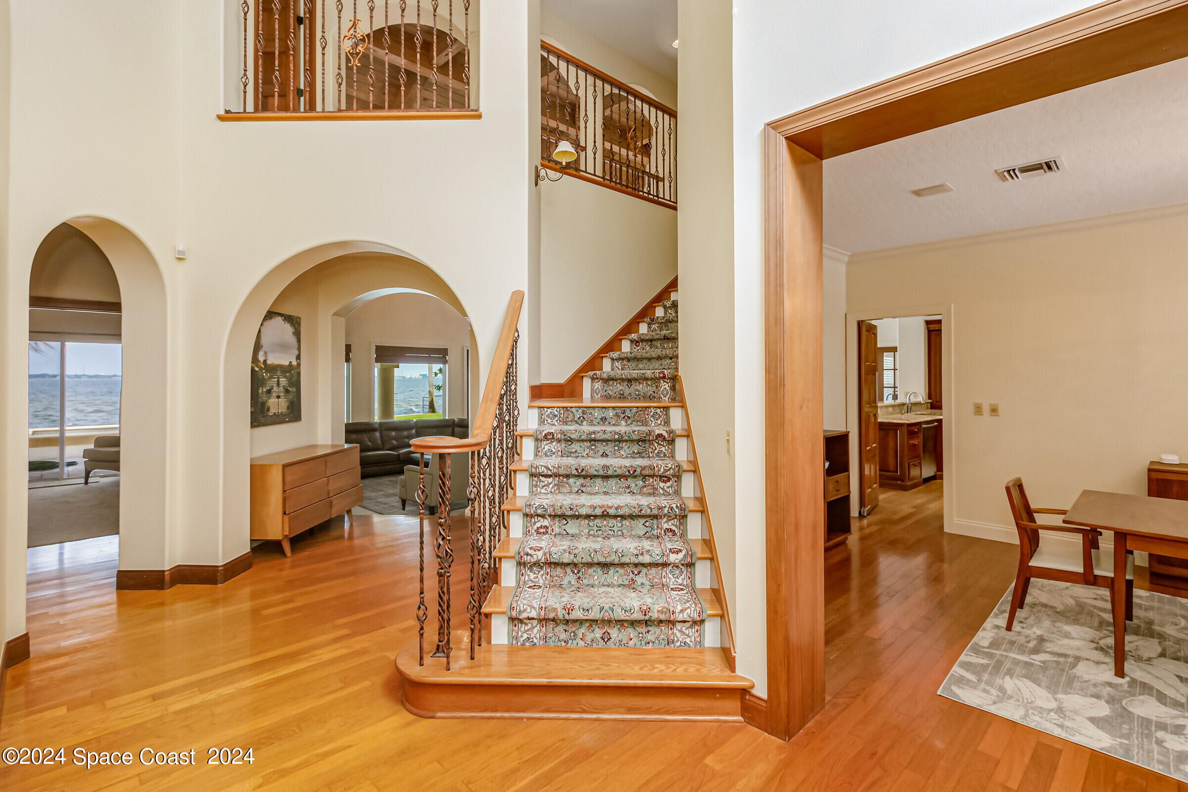 1630 Pine Street Melbourne Beach, FL 32951 - Photo 27 of 54 a view of entryway and hall with wooden floor