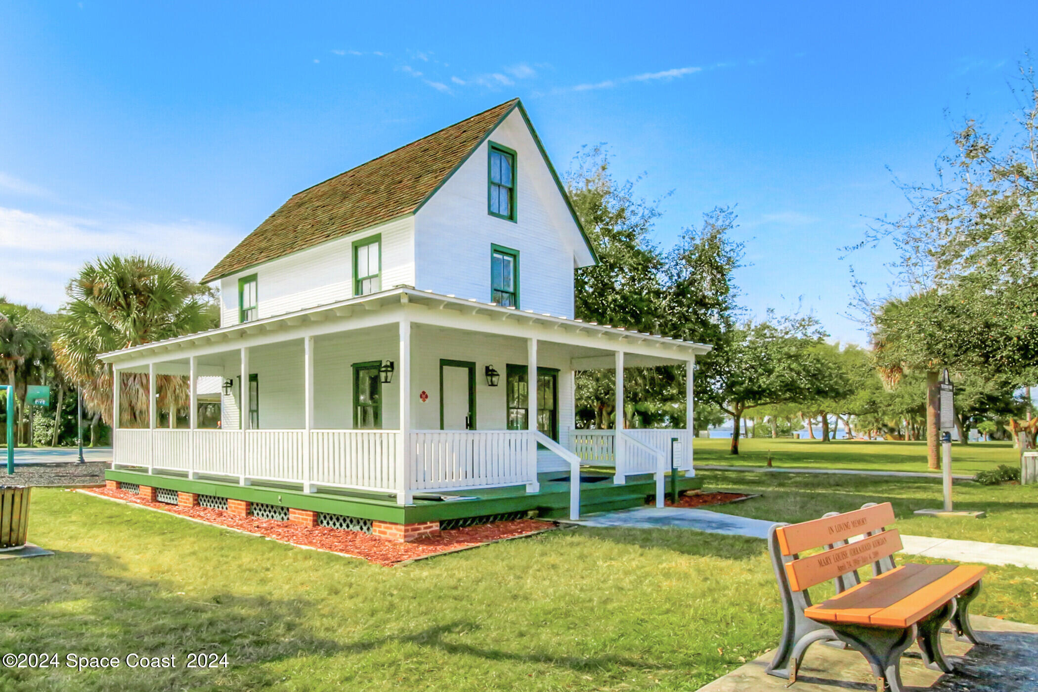 1630 Pine Street Melbourne Beach, FL 32951 - Photo 46 of 54 a view of a house with a yard patio and a garden