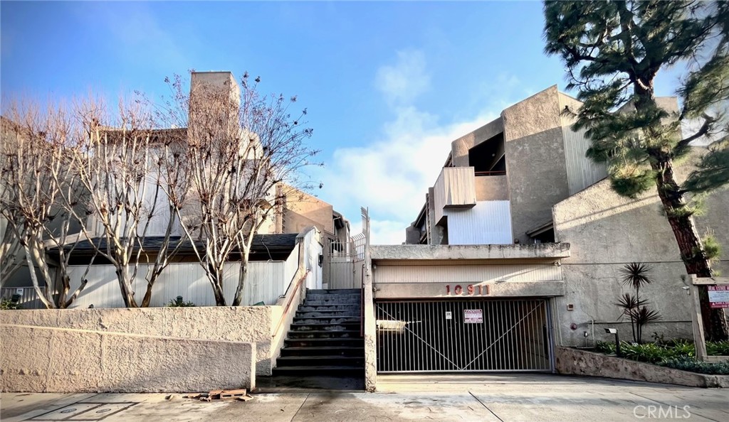 a building with trees in front of it
