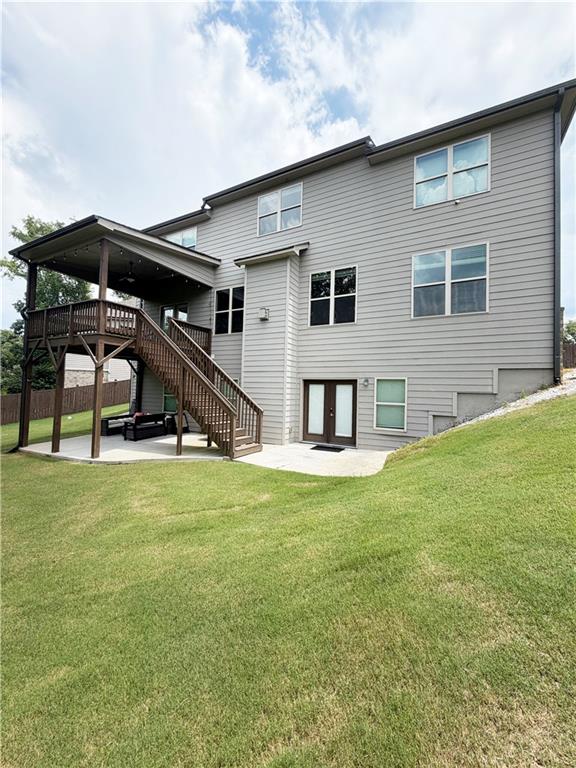5296 Cheval Rue Court Suwanee, GA 30024 - Photo 48 of 51 a house view with a garden space