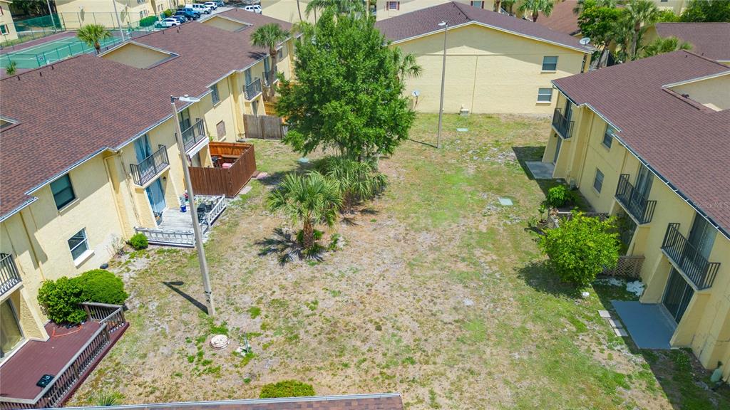 7531 Abonado Road, Unit 1 Tampa, FL 33615 - Photo 25 of 26 an aerial view of a house with a yard