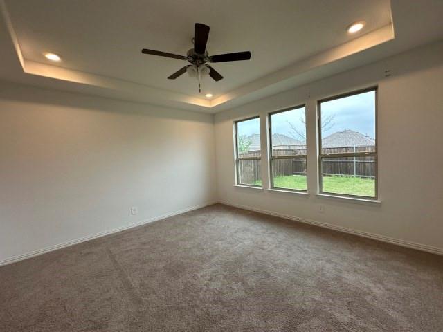 1307 Wheelwright Drive Forney, TX 75126 - Photo 14 of 25 a view of a livingroom with a ceiling fan and window