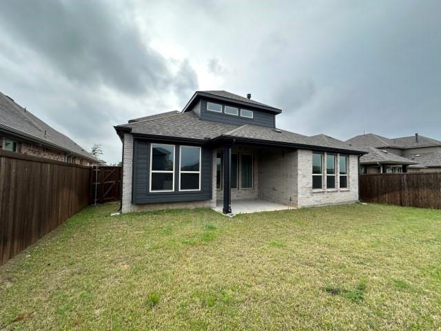 1307 Wheelwright Drive Forney, TX 75126 - Photo 2 of 25 a front view of a house with garden