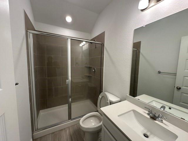 1307 Wheelwright Drive Forney, TX 75126 - Photo 21 of 25 a bathroom with a sink toilet and shower