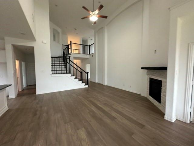 1307 Wheelwright Drive Forney, TX 75126 - Photo 7 of 25 a view of an empty room with wooden floor fireplace and a window