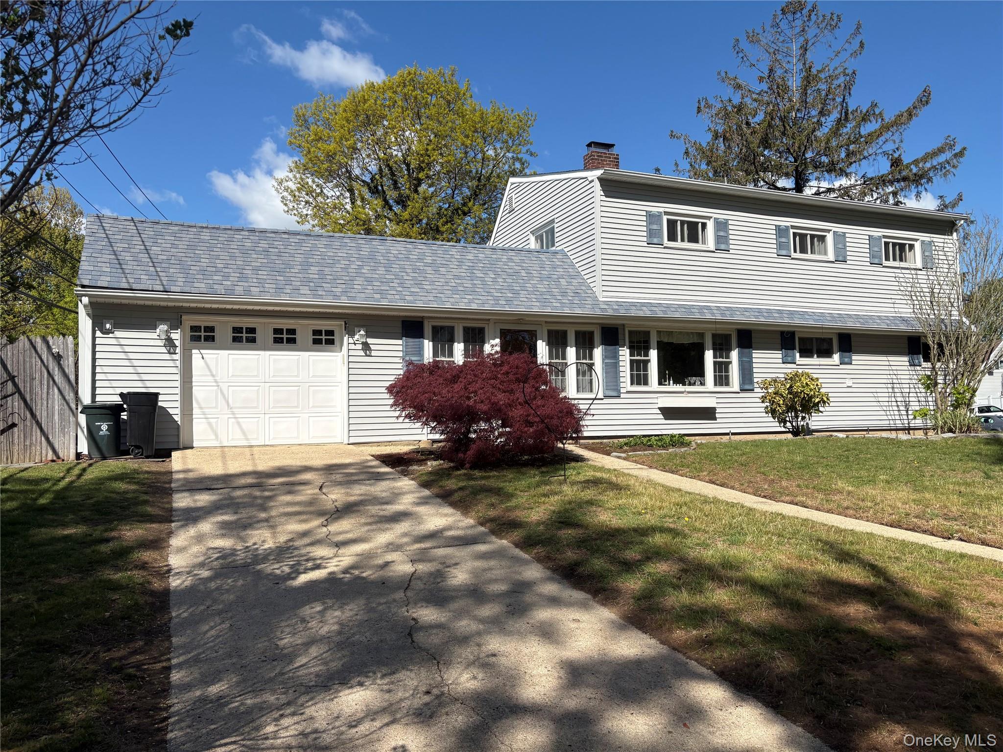 2 Dwarf Lane Wantagh, NY 11793 - Photo 3 of 22 1.5 car garage with 2 car driveway parking