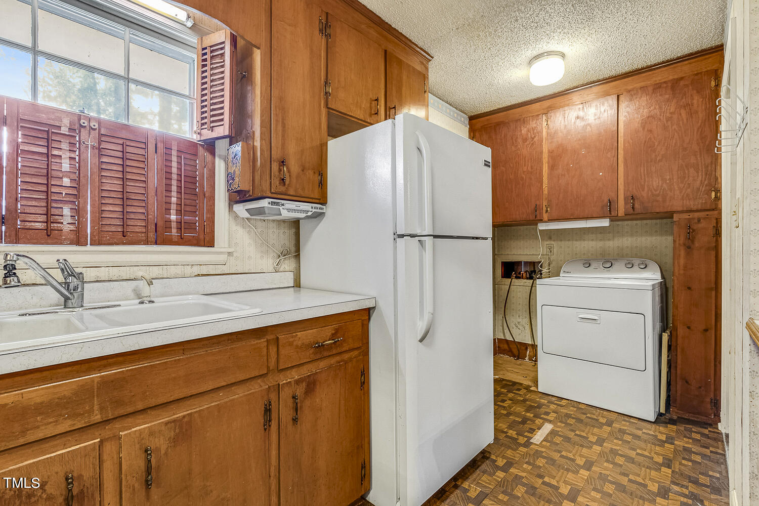 6320 Buffaloe Road Raleigh, NC 27604 - Photo 22 of 50 a utility room with dryer and washer
