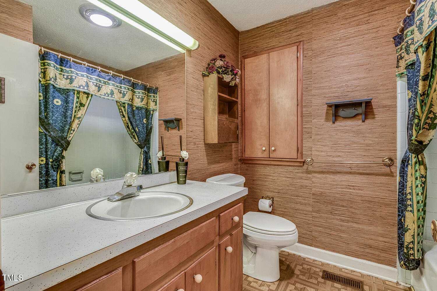 6320 Buffaloe Road Raleigh, NC 27604 - Photo 35 of 50 a bathroom with a granite countertop sink toilet and shower
