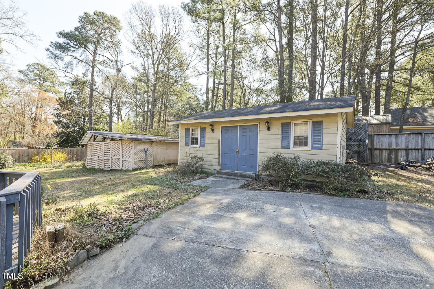 6320 Buffaloe Road Raleigh, NC 27604 - Photo 42 of 50 a view of a house with backyard and trees